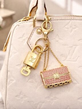 Authentic Louis Vuitton Gold Lock & Key with unbranded Mini Bagcharm, Keycharm